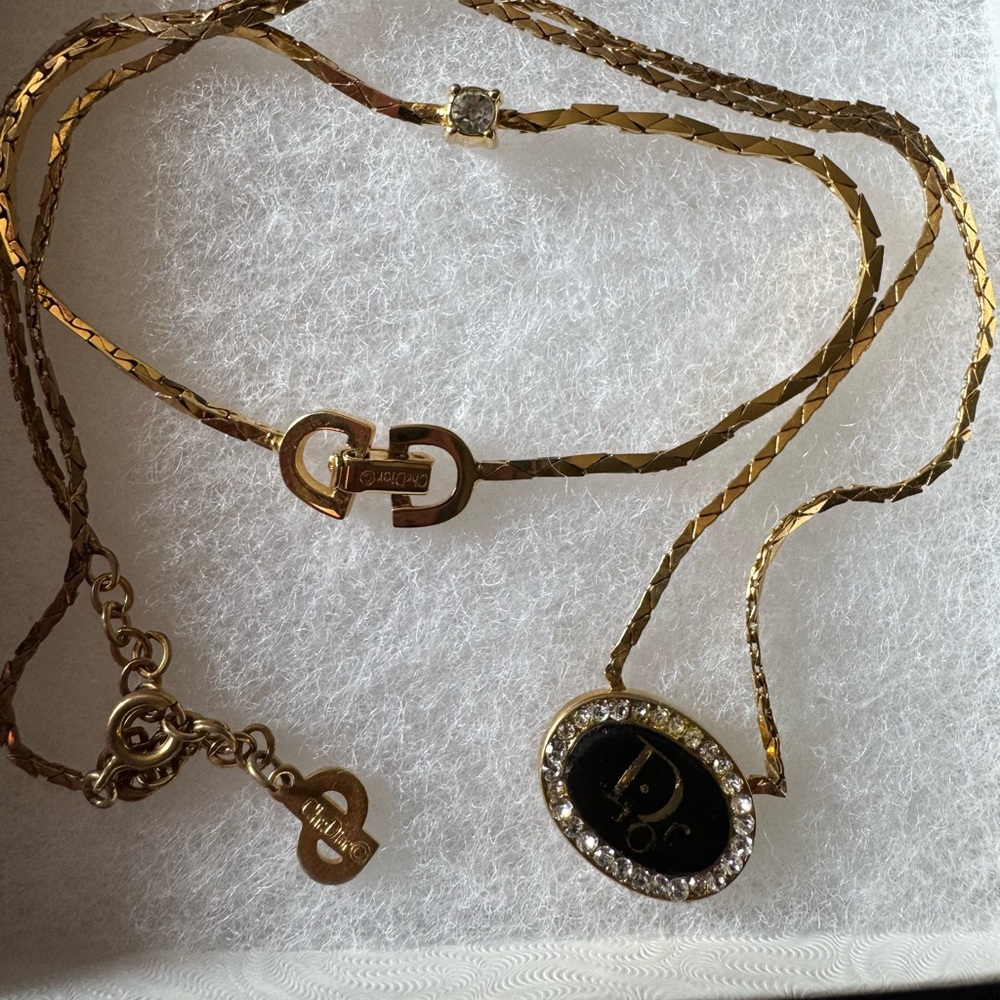 Dior Gold and Black Pendant Necklace and bracelet